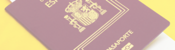spanish passport over spanish flag immigration consultation