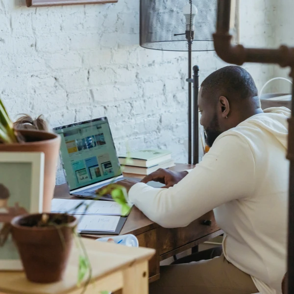 man working in his laptop - ET Recruiting